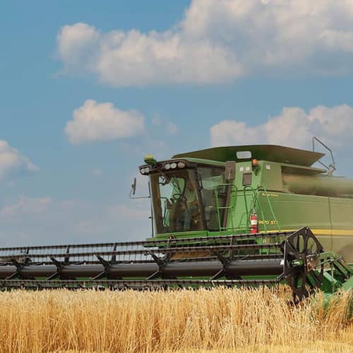 Combine Harvester at work in wheat field