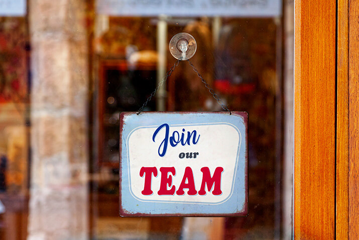 Join Our Team Sign on Restaurant Door