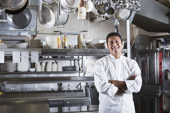 Chef Smiling in Kitchen