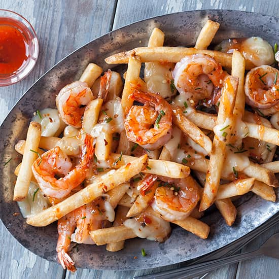 Spicy Shrimp Poutine with Sweet Chili Sauce Recipe | Simplot Foods