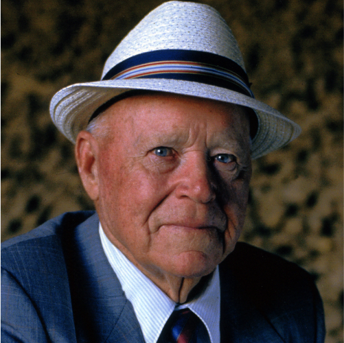 Picture of company foudner J.R. Simplot in blue suit jacket and white hat.