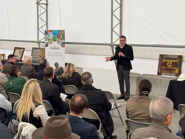 Garrett Lofto speaks at the 80th anniversary celebration