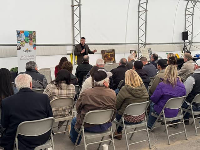 AgriBusiness President G. Ray Reinhardt makes remarks at the Don Plant 80th anniversary celebration