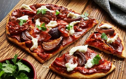 Prosciutto And Caramelised Onion Pizza