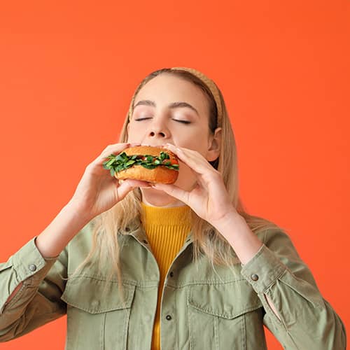 Girl eating burger 