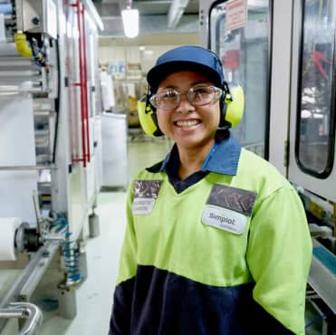 Woman working in manufacturing plant