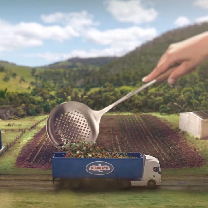 Illustrated advertisement of a food ladle picking up peas from a field and dropping them into a Birds Eye truck.